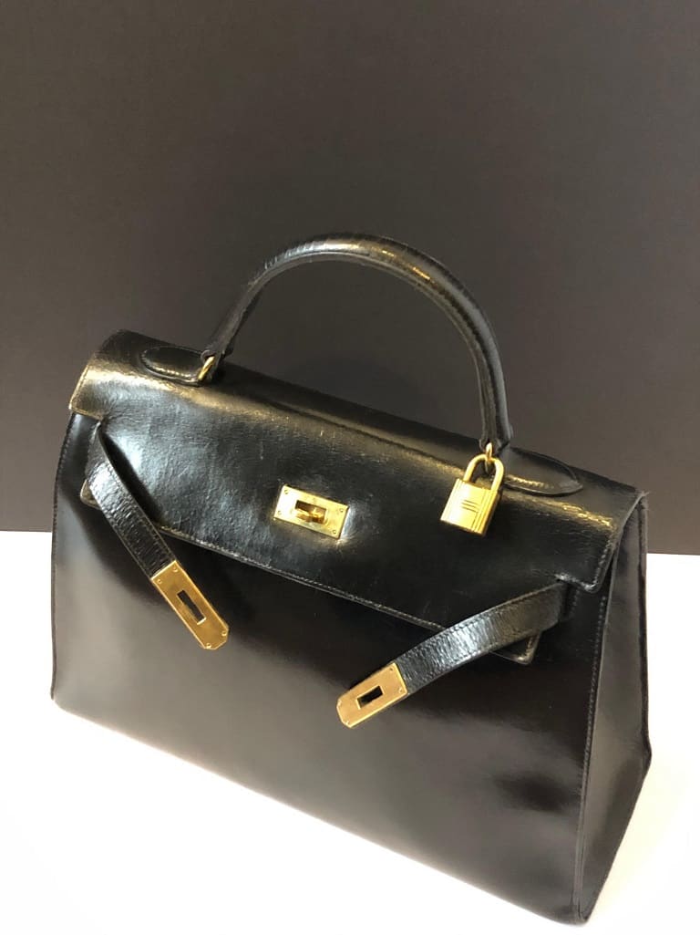 Lot - Hermes Kelly Sellier Handbag, c. 1987, in natural black box