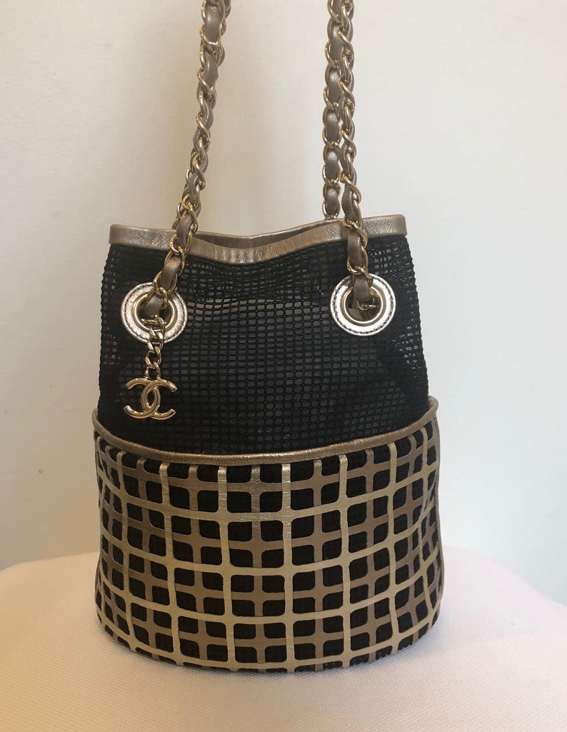 black and gold bucket bag