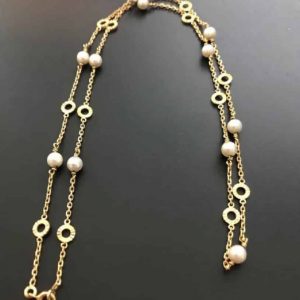 https://chelseavintagecouture.com/wp-content/uploads/2020/10/18k-yellow-gold-necklace-circular-motifs-with-cultured-pearls-1-1-300x300.jpg