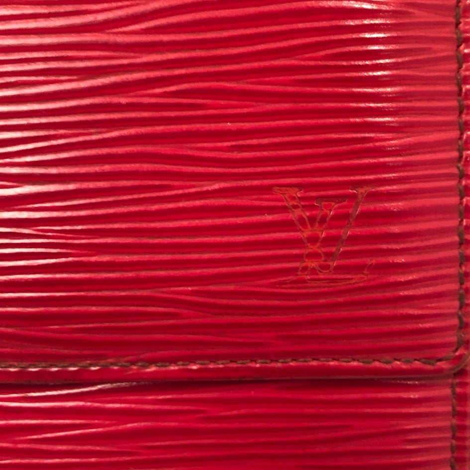Leather wallet Louis Vuitton Red in Leather - 19169677