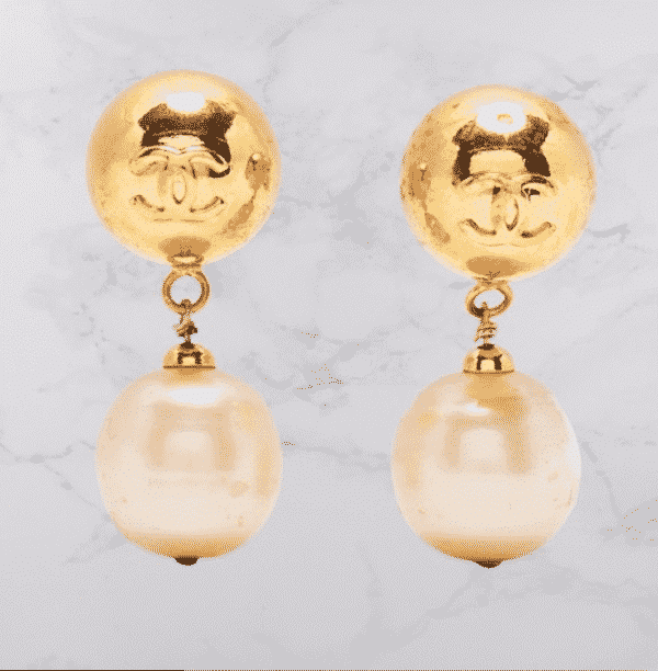 CHANEL Pre-Owned CC drop-pendant clip-on earrings