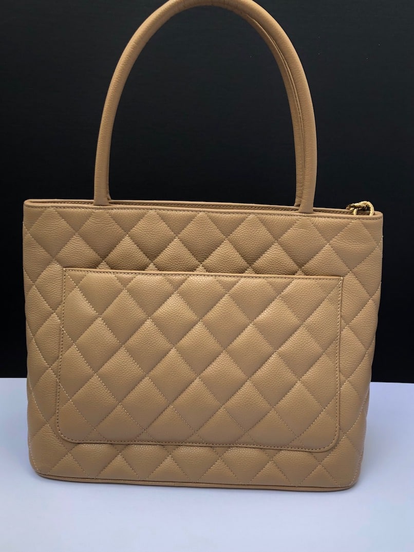 Chanel // 2002 - 2003 Beige Caviar Leather Medallion Tote Bag – VSP  Consignment