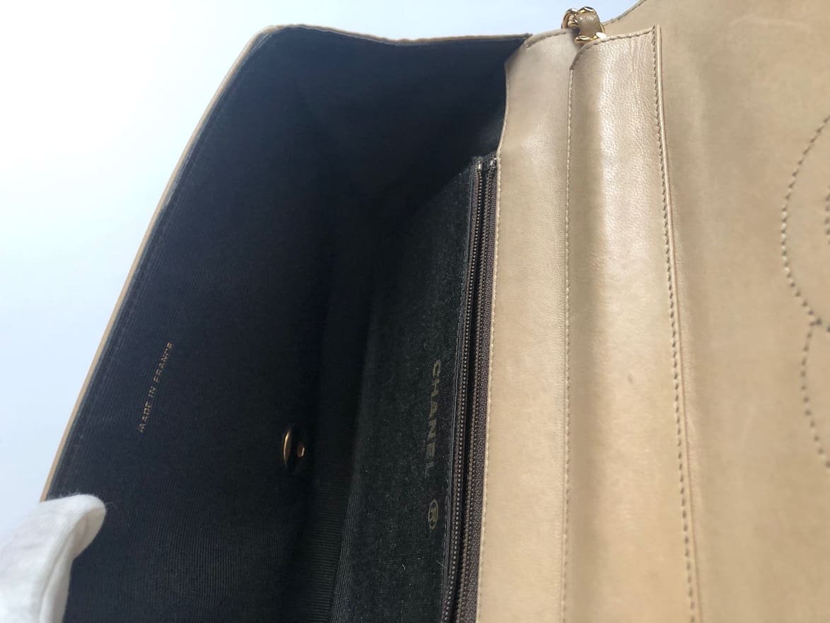 CHANEL Vintage Half Moon Shoulder Bag Beige Quilted Leather Gold Hardware  1980s - Chelsea Vintage Couture
