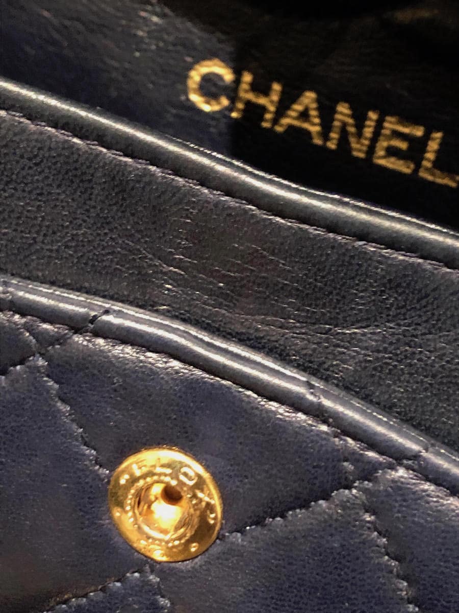 Sold at Auction: A Chanel navy quilted lambskin leather flap bag, 1980s
