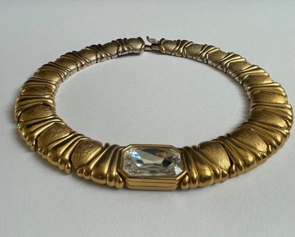 yves saint laurent haute couture by caillol gold plated textured emerald crystal necklace 1980s