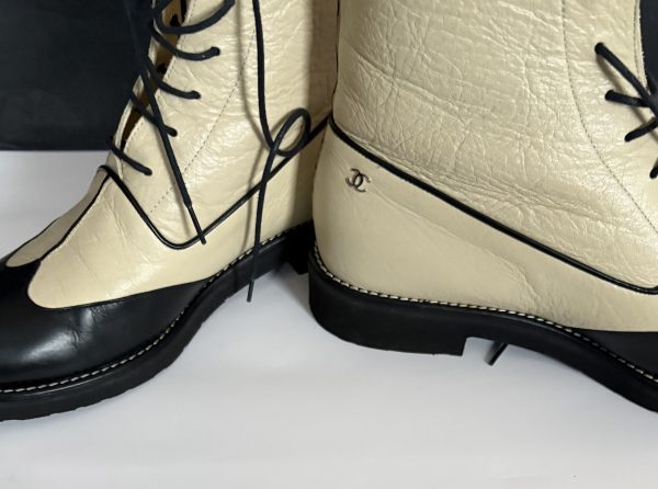 chanel cc logo cream black lambskin lace up combat boots