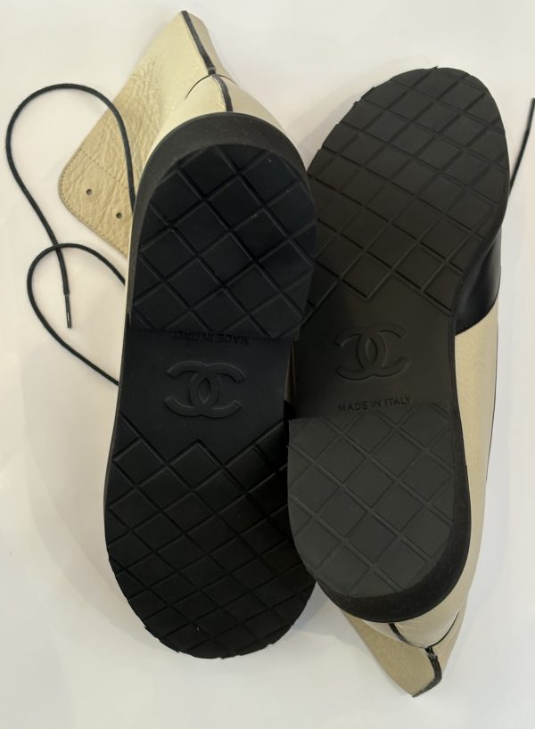 chanel cc logo cream black lambskin lace up combat boots