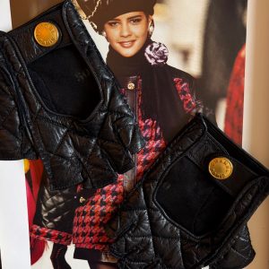 chanel vintage catwalk black quilted kidskin fingerless gloves cc logo buttons c.1990s