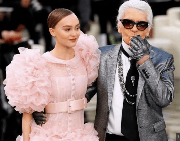 chanel vintage catwalk black quilted kidskin fingerless gloves cc logo buttons c.1990s