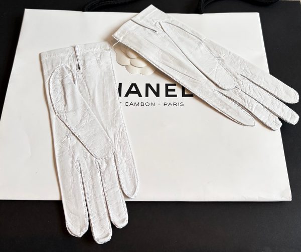 chanel vintage white kidskin gloves with black coco chanel logo c.1990s