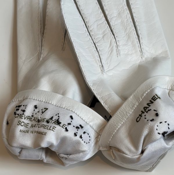 chanel vintage white kidskin gloves with black coco chanel logo c.1990s