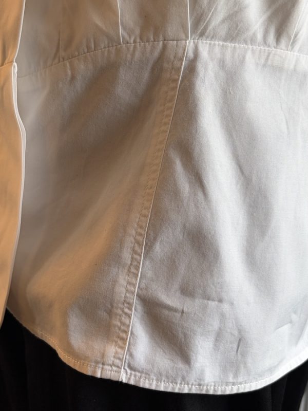 1980s chanel vintage white pleated v cut blouse with chanel jewel buttons