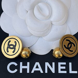 chanel vintage cc logo round disk gold and black cufflinks unisex 1994