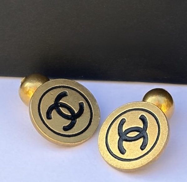 chanel vintage cc logo round disk gold and black cufflinks unisex 1994